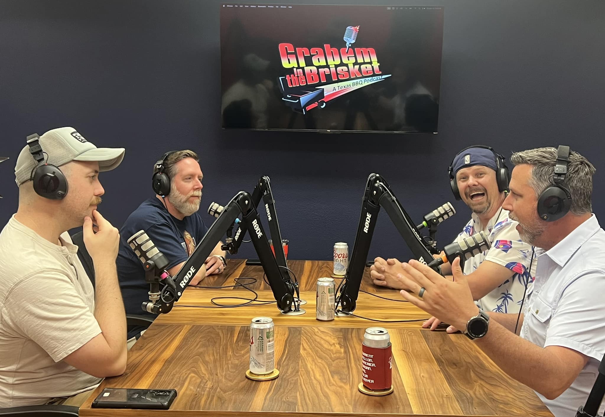 Podcast hosts recording at Pearland Podcast Studio